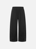 Eyelet-Studded Paneled Baggy Sweatpants