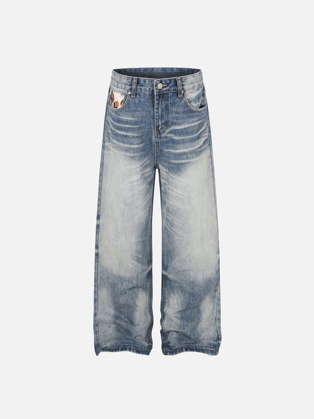 Cow-Print Patch Whiskered Straight-Leg Jeans
