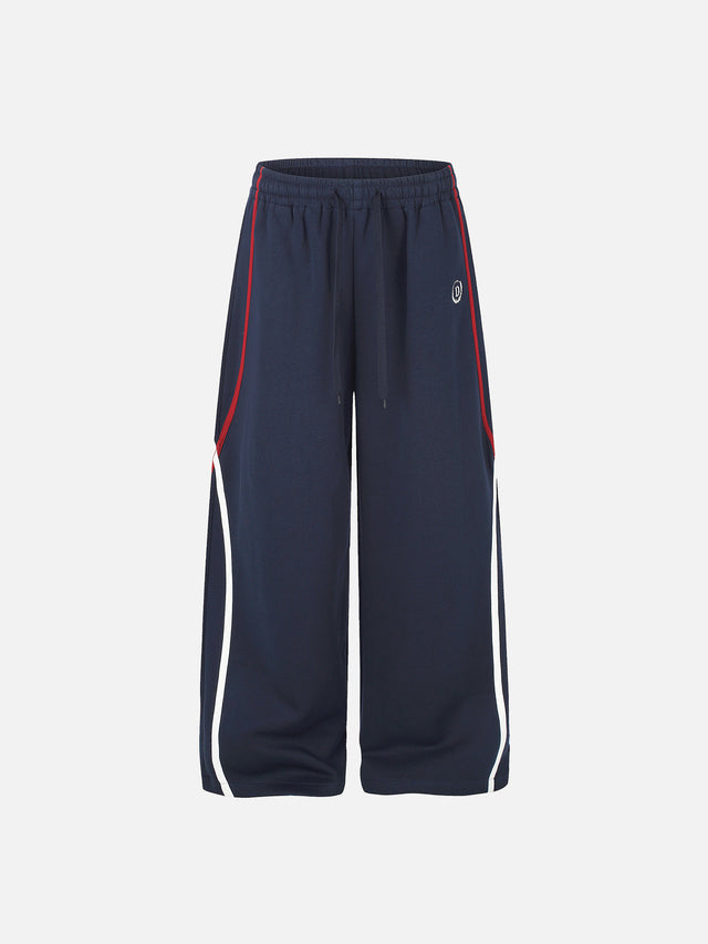 Contrast-Piped Curved-Seam Baggy Track Pants