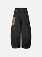 Snakeskin-Panelled Embroidered Baggy Jeans