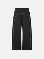 Eyelet-Studded Paneled Baggy Sweatpants