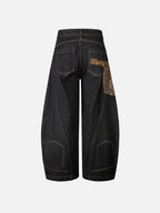 Snakeskin-Panelled Embroidered Baggy Jeans