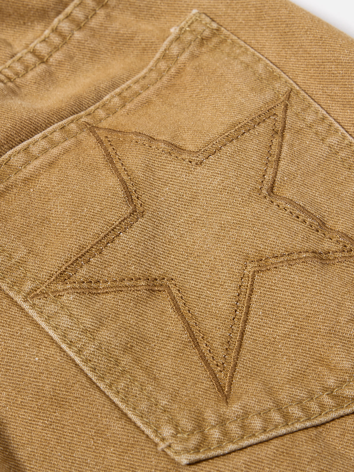 Curved-Panel Seam Star-Embroidered Baggy Denim Jeans