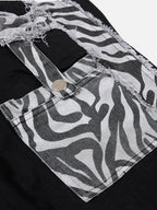 Zebra-Print Raw-Hem Flared Jeans