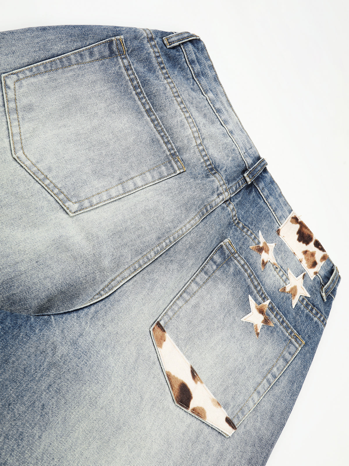 Cow-Print Patch Whiskered Straight-Leg Jeans