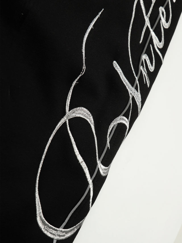 Reflective Piping Cursive Script Embroidered Baggy Sweatpants